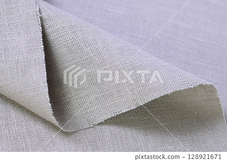 beige hemp viscose natural fabric cloth color; sackcloth rough texture of textile fashion beige hemp viscose natural fabric cloth color; sackcloth rough texture of textile fashion 128921671
