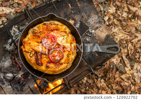 Pizza: Make homemade pizza outdoors in the oven 128922702