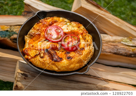 Pizza: Make homemade pizza outdoors in the oven 128922703