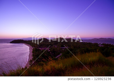 Oceania, Fiji, Republic of Viti Levu, west off the coast of the Mamanuca Islands, dawn on North Beach from the observation deck on Mana Island 128923236