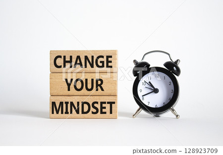 Change your mindset symbol. Concept words Change your mindset on wooden blocks with alarm clock. Beautiful white background. Business and Change your mindset concept. Copy space. Change your mindset symbol. Concept words Change your mindset on wooden blocks with alarm clock. Beautiful white background. Business and Change your mindset concept. Copy space. 128923709