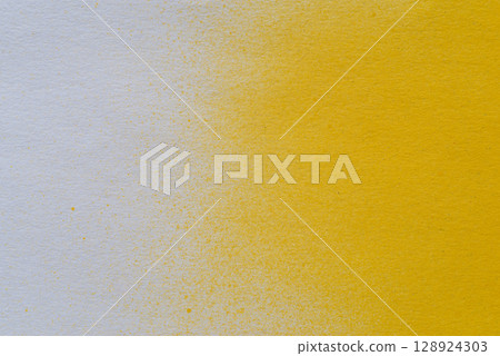Yellow spray paint background 128924303