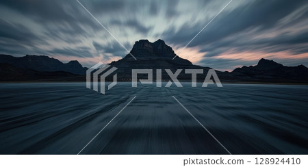 Dramatic Mountain Landscape Dark Sky Sunset Road Motion Blur view wild rock blue grey pink peaks Dramatic Mountain Landscape Dark Sky Sunset Road Motion Blur view wild rock blue grey pink peaks 128924410