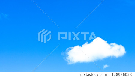 A simple landscape of white clouds floating in the blue summer sky A simple landscape of white clouds floating in the blue summer sky 128926038