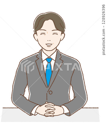 A middle-aged man in a suit with his hands folded and a smile 128926396
