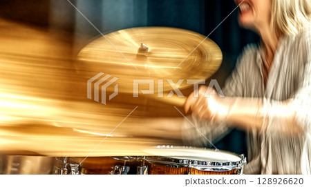 Professional drummer performing live with passion and energy 128926620