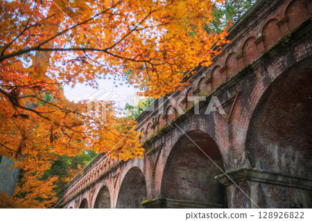 Nanzen-ji Temple brick aqueduct with maple leaf in autumn, Kyoto 128926822