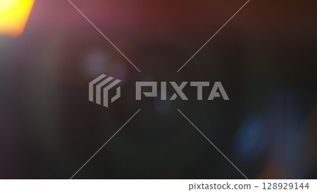 Abstract background of real lens flare for overlay or transition 128929144