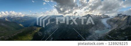 Panoramic view of summer landscape in the Swiss Alps , Furka pass with glacier 128929225