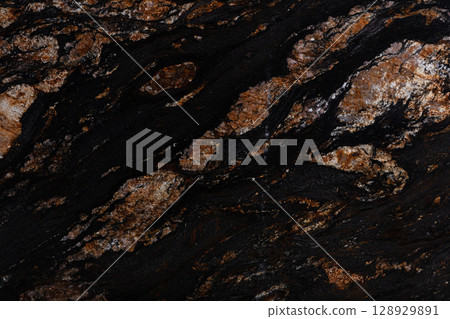 Natural Black Magma granite texture, strict background in dark color. Natural Black Magma granite texture, strict background in dark color. 128929891