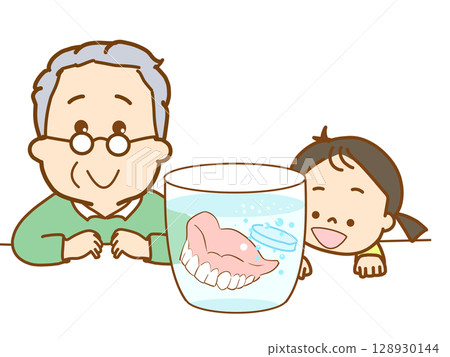 Grandfather and grandson looking at dentures in cleaning solution to keep them clean 128930144