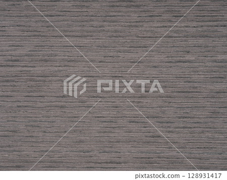 Subtle elegance in slate grey tones on a seamless ash wood veneer surface 128931417