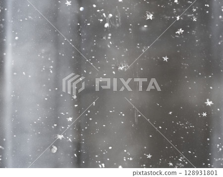 Snow, falling glass starry sky creates dreamy, captivating view, evoking sense calm winter night. Its gentle beauty leaves you feeling peaceful airy 128931801
