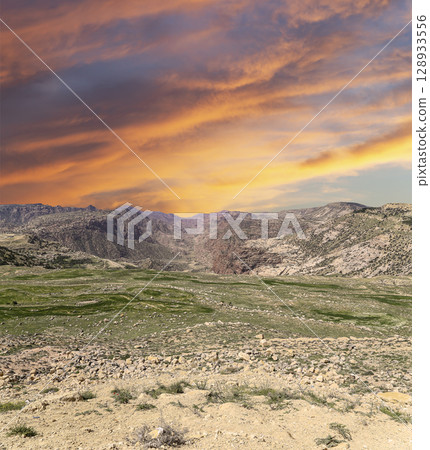 Typical mountain landscape, Jordan, Middle East  (photography from a high point). Against the background of a beautiful sky with clouds 128933556