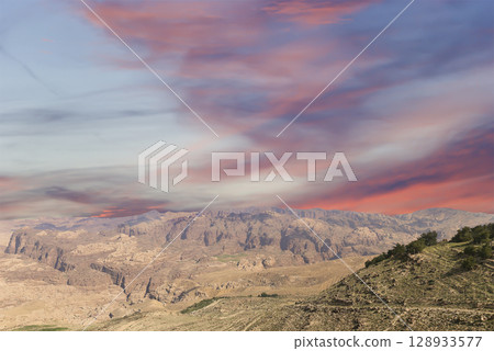 Typical mountain landscape, Jordan, Middle East  (photography from a high point). Against the background of a beautiful sky with clouds 128933577