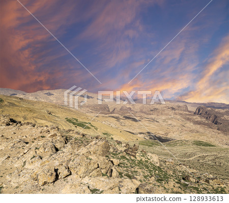 Typical mountain landscape, Jordan, Middle East  (photography from a high point). Against the background of a beautiful sky with clouds 128933613
