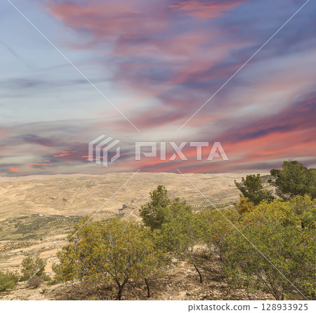 Typical mountain landscape, Jordan, Middle East  (photography from a high point). Against the background of a beautiful sky with clouds 128933925