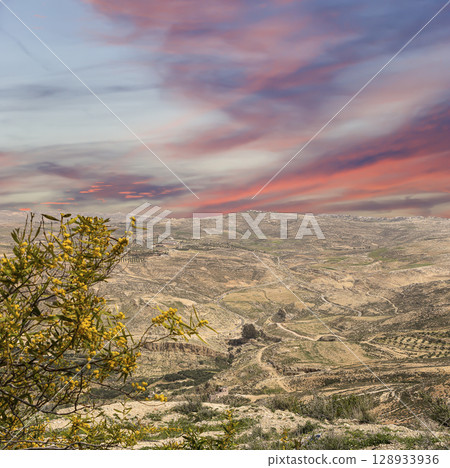 Typical mountain landscape, Jordan, Middle East  (photography from a high point). Against the background of a beautiful sky with clouds 128933936
