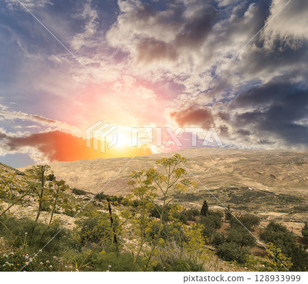Typical mountain landscape, Jordan, Middle East  (photography from a high point). Against the background of a beautiful sky with clouds 128933999