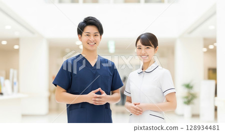 Asian nurse standing with a smile 128934481