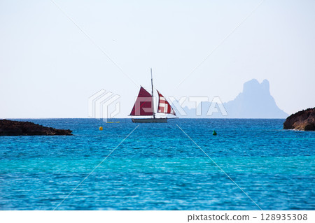 Formentera from Illetes view es Vedra Ibiza and sailboat 128935308