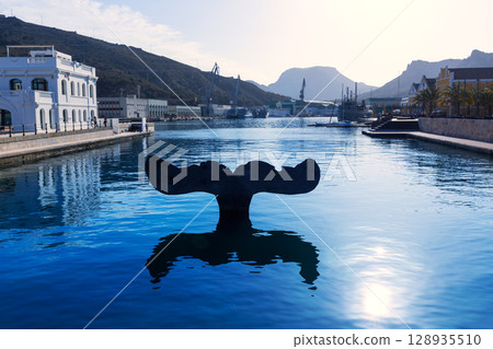 Whale tail sculpture in Cartagena port at Murcia 128935510