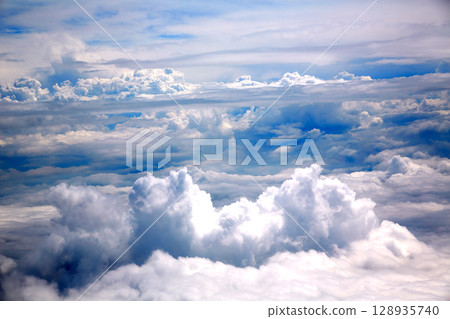 Clouds sea aircraft view aerial dramatic Clouds sea aircraft view aerial dramatic 128935740