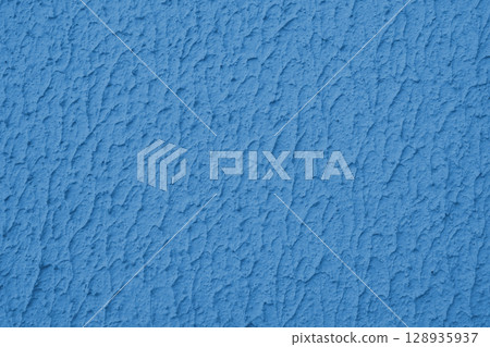Rough blue colored concrete or plaster wall texture background 128935937