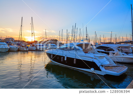Denia sunset in Marina boats Mediterranean Spain Denia sunset in Marina boats Mediterranean Spain 128936394
