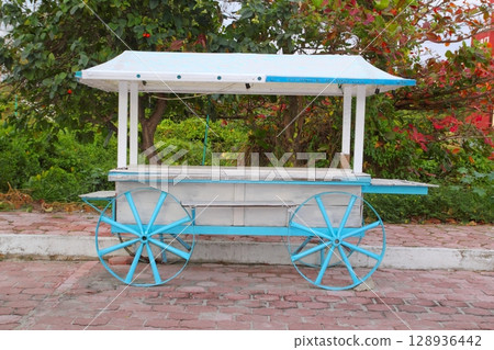 Icecream hot dogs cart white blue in Caribbean island 128936442