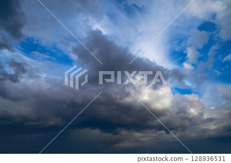 Dramatic clouds sky in a stormy weather Dramatic clouds sky in a stormy weather 128936531
