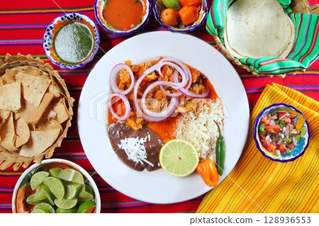 fajitas mexican food with rice frijoles chili sauce 128936553