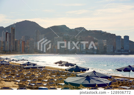 Benidorm sunrise with hammocks and parasol Benidorm sunrise with hammocks and parasol 128936772