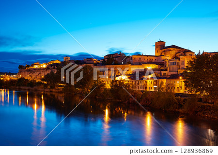Zamora skyline at sunset by Duero river Spain 128936869