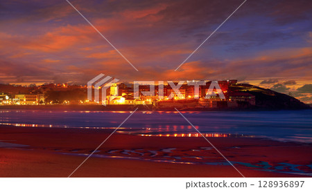 Gijon skyline sunset in San Lorenzo beach Asturias Gijon skyline sunset in San Lorenzo beach Asturias 128936897