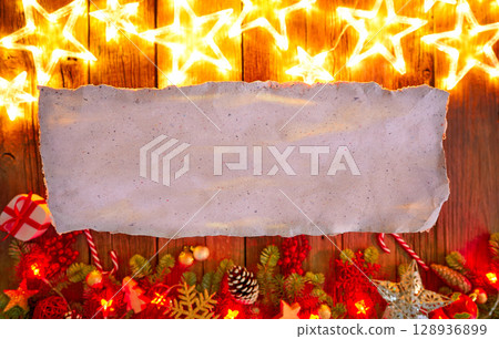 Christmas glow stars and fir white paper Christmas glow stars and fir white paper 128936899
