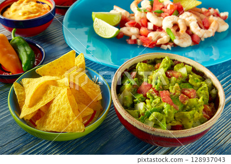 Guacamole mexican food with ceviche and nachos Guacamole mexican food with ceviche and nachos 128937043