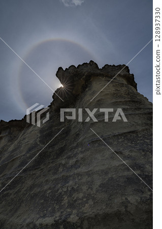 Bell Rock and the sun halo phenomenon in Tutira, Hawke's Bay, New Zealand 128937330