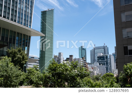 Landscape with buildings and greenery 128937695