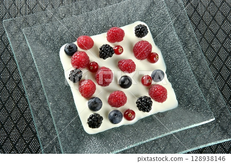Mix of varied berries and cream Mix of varied berries and cream 128938146