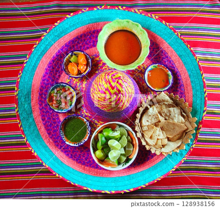 Mexican sauces spices chili on Mexican hat 128938156