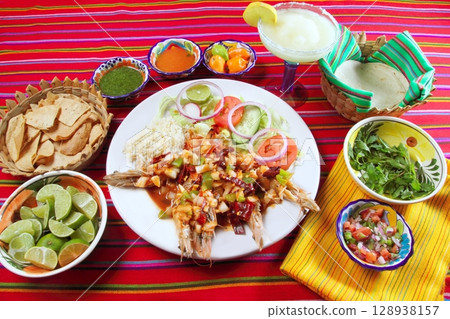 Guajillo chili shrimps Mexican dish chili sauces 128938157