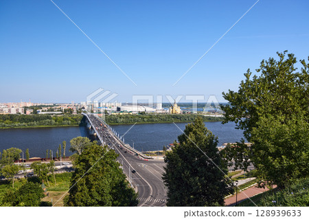 Sunlit Strelka, Cathedral and Kanavinsky Bridge in Nizhny Novgorod Sunlit Strelka, Cathedral and Kanavinsky Bridge in Nizhny Novgorod 128939633