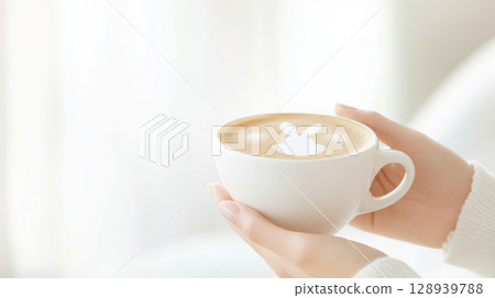 Easter-themed coffee latte art with bunny shape on frothy milk, cozy background 128939788