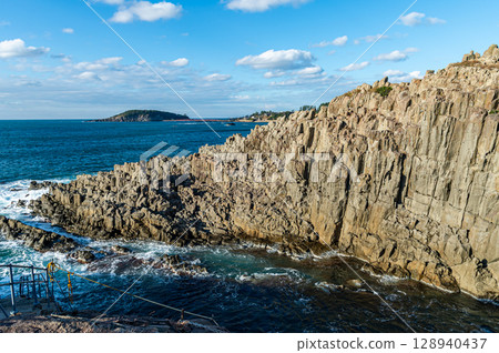 The blue sea and blue sky seen from Tojinbo 128940437