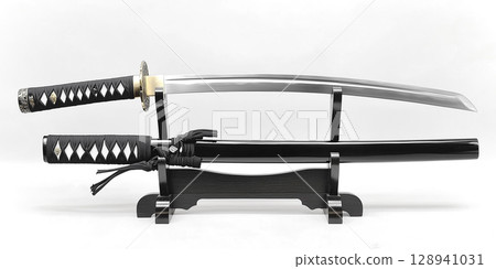 A full-length photo of a beautiful Japanese sword displayed on a pedestal. White background 128941031
