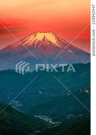 Mount Fuji and the green valley at sunrise Mount Fuji and the green valley at sunrise 128942447