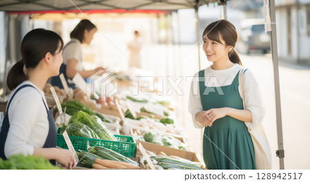 Woman buying vegetables 128942517