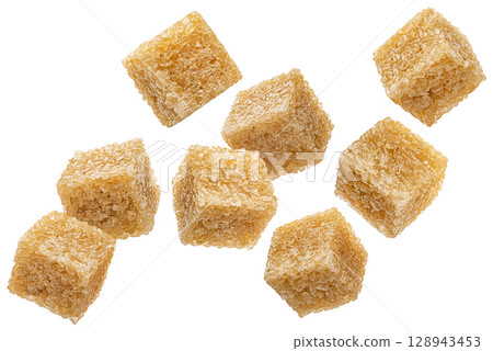 Cubes of brown cane sugar isolated on white background, full depth of field 128943453