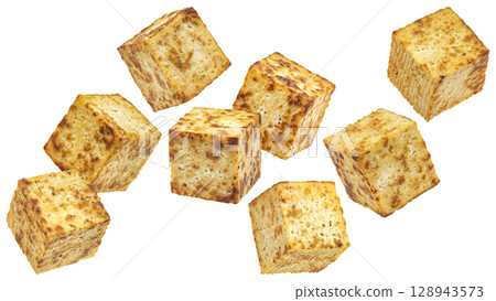 Falling fried tofu cubes isolated on white background with clipping path 128943573